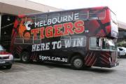 Double Decker bus wrapped in General Formulations Automark advertising Melbourne Tigers